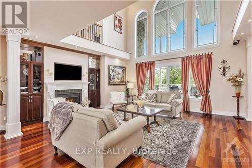 1284 Rideau Cove Court, Ottawa, ON - Indoor Photo Showing Living Room With Fireplace