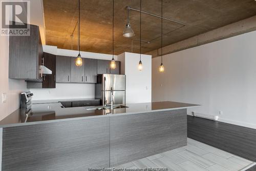 1445 Ouellette Unit# Loft 2, Windsor, ON - Indoor Photo Showing Kitchen With Stainless Steel Kitchen With Double Sink