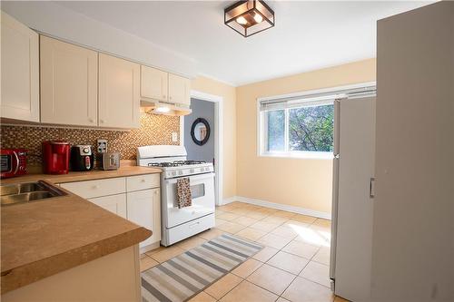 197 Fennell Avenue E, Hamilton, ON - Indoor Photo Showing Kitchen With Double Sink
