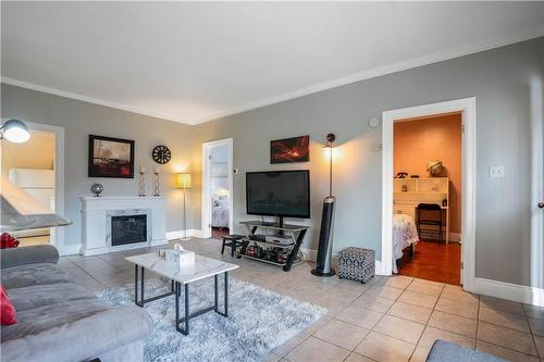 197 Fennell Avenue E, Hamilton, ON - Indoor Photo Showing Living Room With Fireplace