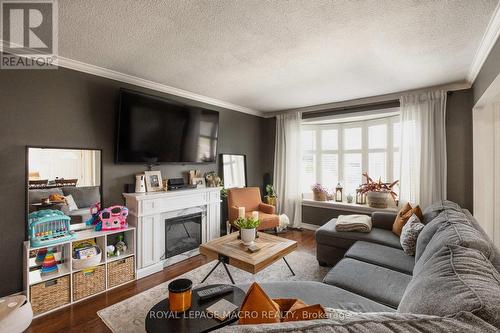 15 Locheed Drive, Hamilton, ON - Indoor Photo Showing Living Room With Fireplace