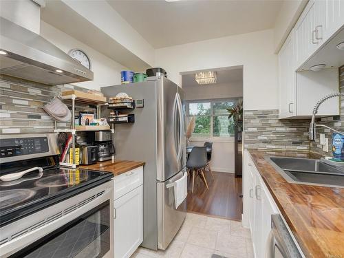 302-1597 Midgard Ave, Saanich, BC - Indoor Photo Showing Kitchen With Double Sink