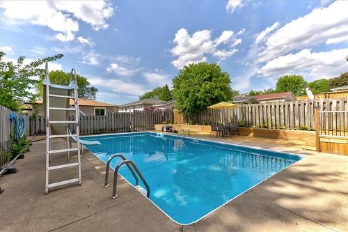 66 Silver Aspen Crescent, Kitchener, ON - Outdoor With In Ground Pool With Backyard