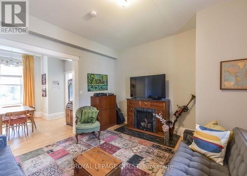 120 Brant Street E, Orillia, ON - Indoor Photo Showing Living Room With Fireplace