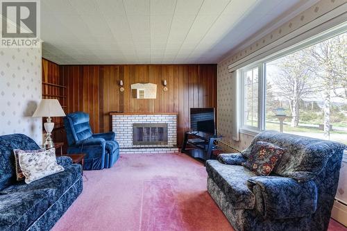 6-8 Ryans Road, Spaniards Bay, NL - Indoor Photo Showing Living Room With Fireplace
