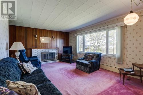 6-8 Ryans Road, Spaniards Bay, NL - Indoor Photo Showing Living Room With Fireplace