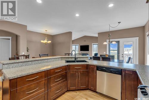 303 Brookside Drive, Warman, SK - Indoor Photo Showing Kitchen With Double Sink