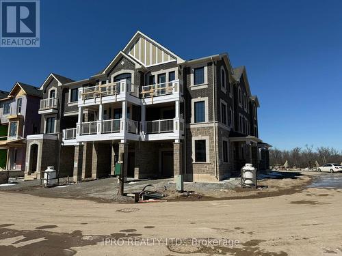 1893 Thames Circle, Milton, ON - Outdoor With Balcony With Facade