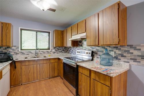 219-3020 Allenby Way, Vernon, BC - Indoor Photo Showing Kitchen With Double Sink