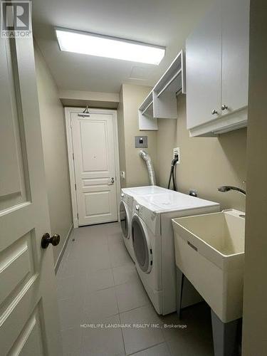2906 - 183 Wellington Street W, Toronto, ON - Indoor Photo Showing Laundry Room
