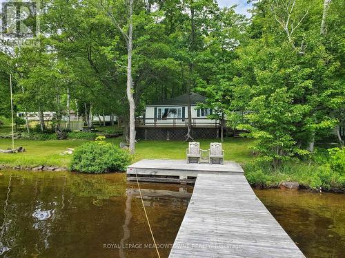 33 Pigeon Bay Road, Parry Sound Remote Area, ON - Outdoor With Body Of Water With Deck Patio Veranda