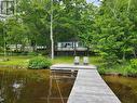 33 Pigeon Bay Road, Parry Sound Remote Area, ON  - Outdoor With Body Of Water With Deck Patio Veranda 