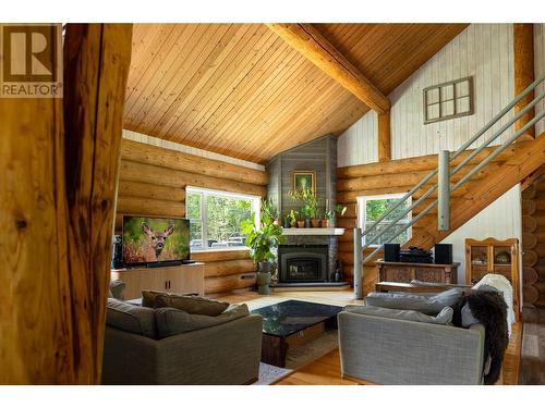 28 Begbie Road, Cherryville, BC - Indoor Photo Showing Living Room With Fireplace