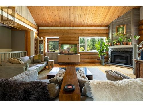 28 Begbie Road, Cherryville, BC - Indoor Photo Showing Living Room With Fireplace