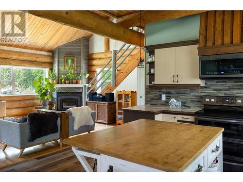 28 Begbie Road, Cherryville, BC - Indoor With Fireplace