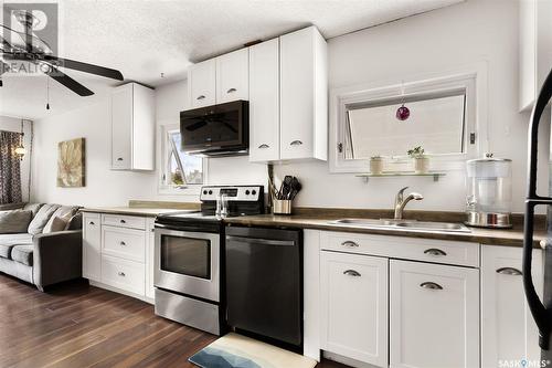 2042 Wascana Street, Regina, SK - Indoor Photo Showing Kitchen With Double Sink