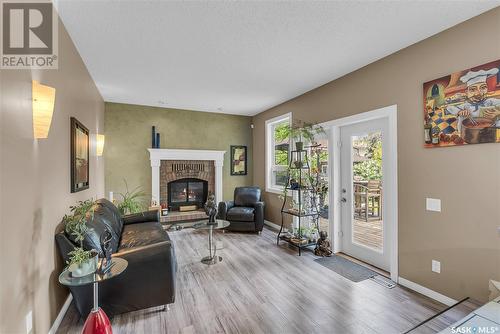 470 Pinehouse Drive, Saskatoon, SK - Indoor Photo Showing Living Room With Fireplace