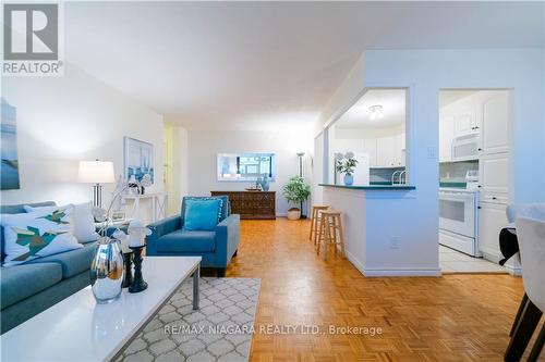 1402 - 215 Glenridge Avenue, St. Catharines, ON - Indoor Photo Showing Living Room