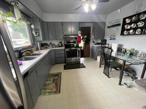 7490 22Nd Street, Grand Forks, BC - Indoor Photo Showing Kitchen With Double Sink