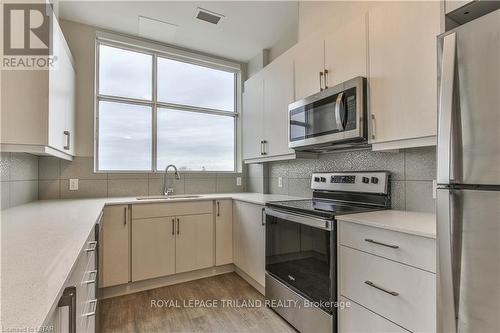 Imported from itso - 601 - 1600 Hyde Park Road, London, ON - Indoor Photo Showing Kitchen With Stainless Steel Kitchen