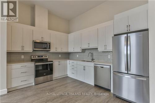 Imported from itso - 706 - 1600 Hyde Park Road, London, ON - Indoor Photo Showing Kitchen With Stainless Steel Kitchen