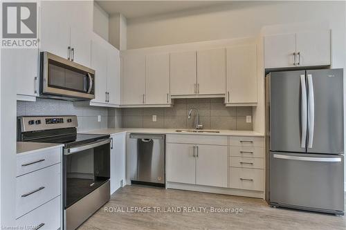 Imported from itso - 709 - 1600 Hyde Park Road, London, ON - Indoor Photo Showing Kitchen With Stainless Steel Kitchen