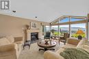 828 Mount Royal Drive, Kelowna, BC  - Indoor Photo Showing Living Room With Fireplace 