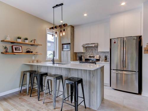 Cuisine - 3464 Rue Des Stellaires, Longueuil (Le Vieux-Longueuil), QC - Indoor Photo Showing Kitchen With Upgraded Kitchen