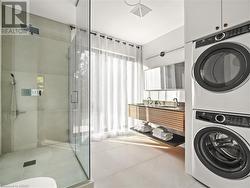 4pc main bathroom with laundry. - 