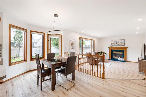 19 Simsbury Place, Winnipeg, MB - Indoor Photo Showing Dining Room With Fireplace