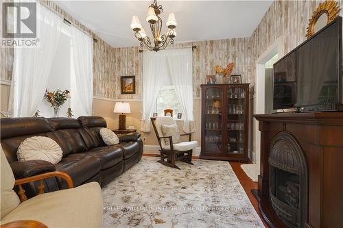 18990 18 County Road, South Glengarry, ON - Indoor Photo Showing Living Room With Fireplace