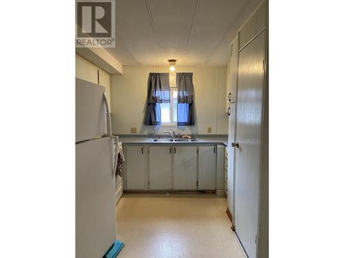 52 4625 Graham Avenue, Terrace, BC - Indoor Photo Showing Kitchen With Double Sink