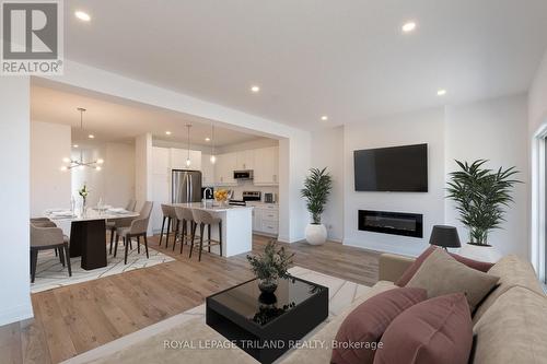 26 - 101 Swales Avenue, Strathroy-Caradoc (Sw), ON - Indoor Photo Showing Living Room With Fireplace