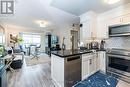 813 - 39 Oneida Crescent, Richmond Hill (Langstaff), ON  - Indoor Photo Showing Kitchen With Stainless Steel Kitchen With Double Sink 