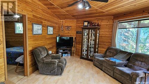 Dr 6 White Birch Drive, Lucien Lake, SK - Indoor Photo Showing Living Room With Fireplace