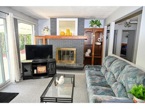 2404 Dogwood Street, Creston, BC - Indoor Photo Showing Living Room With Fireplace