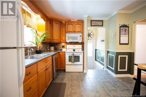 46 Cambridge Crescent, Fredericton, NB - Indoor Photo Showing Kitchen With Double Sink