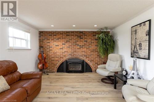 1360 Glenora Drive, London, ON - Indoor Photo Showing Living Room With Fireplace