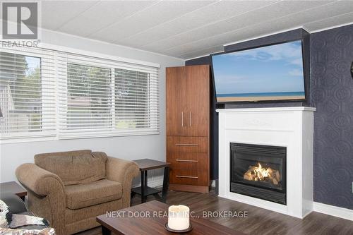 131 Sunningdale Place, South Huron (Stephen Twp), ON - Indoor Photo Showing Living Room With Fireplace