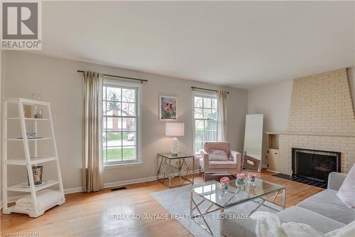 460 Regal Drive, London, ON - Indoor Photo Showing Living Room With Fireplace