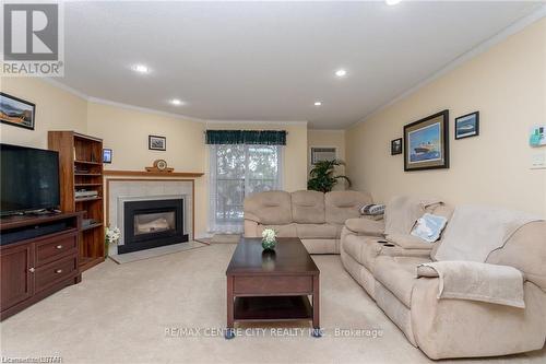 326 - 440 Wellington Street, St. Thomas, ON - Indoor Photo Showing Living Room With Fireplace