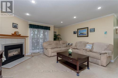 326 - 440 Wellington Street, St. Thomas, ON - Indoor Photo Showing Living Room With Fireplace