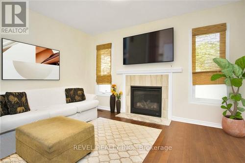 44 - 70 Sunnyside Drive, London, ON - Indoor Photo Showing Living Room With Fireplace