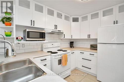 44 - 70 Sunnyside Drive, London, ON - Indoor Photo Showing Kitchen With Double Sink