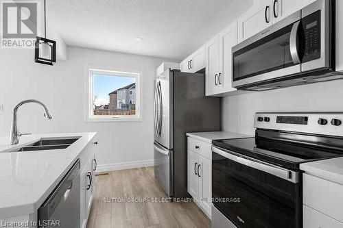 Imported from itso - 5 - 261 Pittock Park Road, Woodstock, ON - Indoor Photo Showing Kitchen With Double Sink