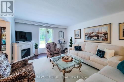 47 Monarch Park Drive, St. Catharines, ON - Indoor Photo Showing Living Room With Fireplace