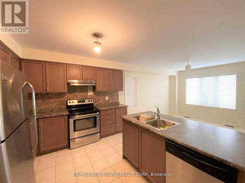 3116 Robert Brown Boulevard, Oakville, ON - Indoor Photo Showing Kitchen With Stainless Steel Kitchen With Double Sink