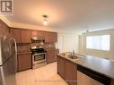 3116 Robert Brown Boulevard, Oakville, ON  - Indoor Photo Showing Kitchen With Stainless Steel Kitchen With Double Sink 