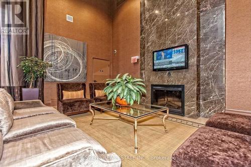 3002 - 385 Prince Of Wales Drive, Mississauga, ON - Indoor Photo Showing Living Room With Fireplace