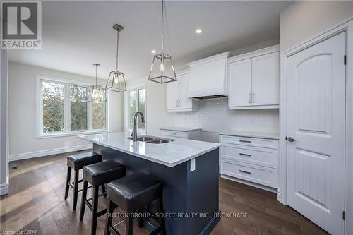 7 Spruce Crescent, North Middlesex (Parkhill), ON - Indoor Photo Showing Kitchen With Double Sink